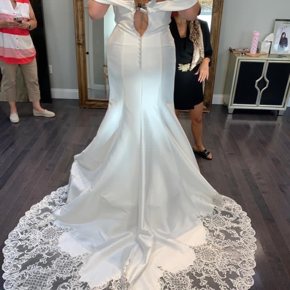 Never worn/altered Wedding Gown.